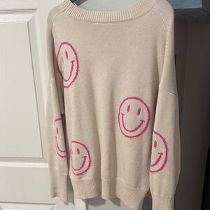 Smiley face knit sweater